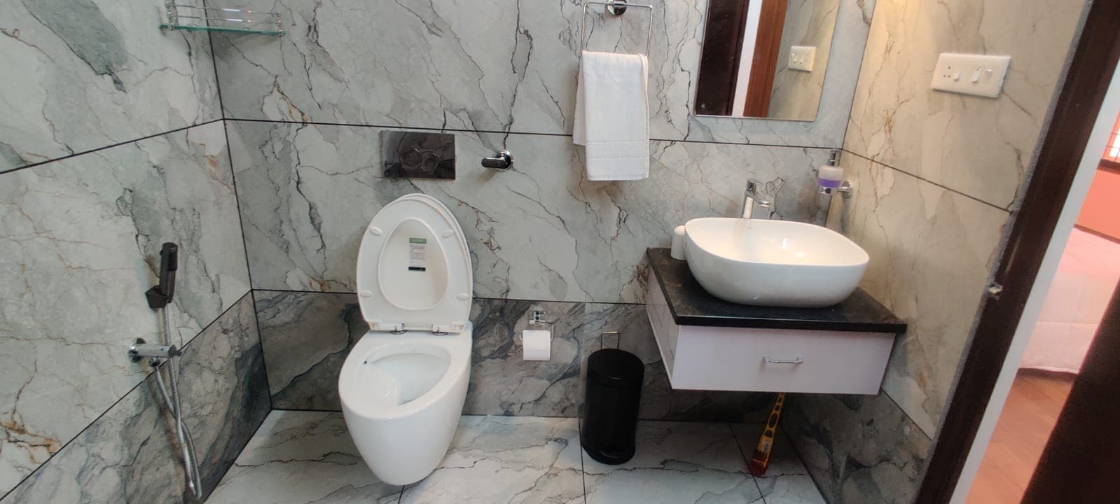 Marble bathroom with vessel basin