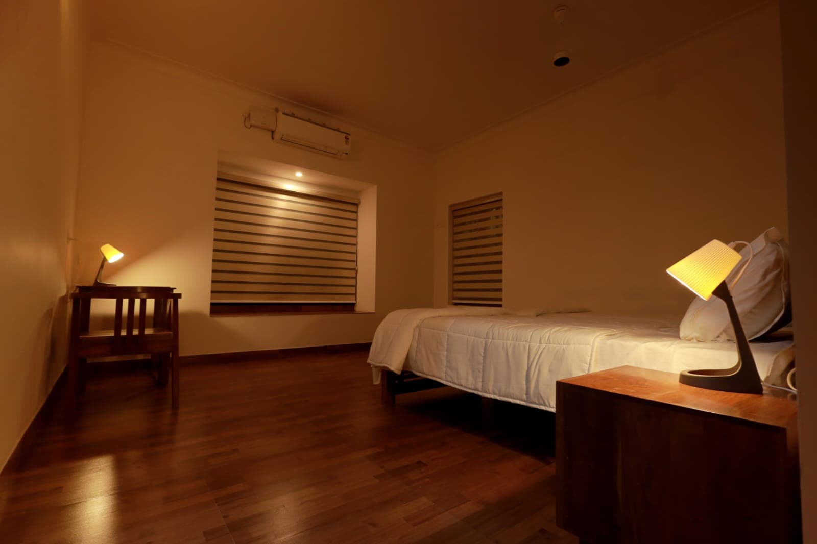 Single bed with woven window blinds