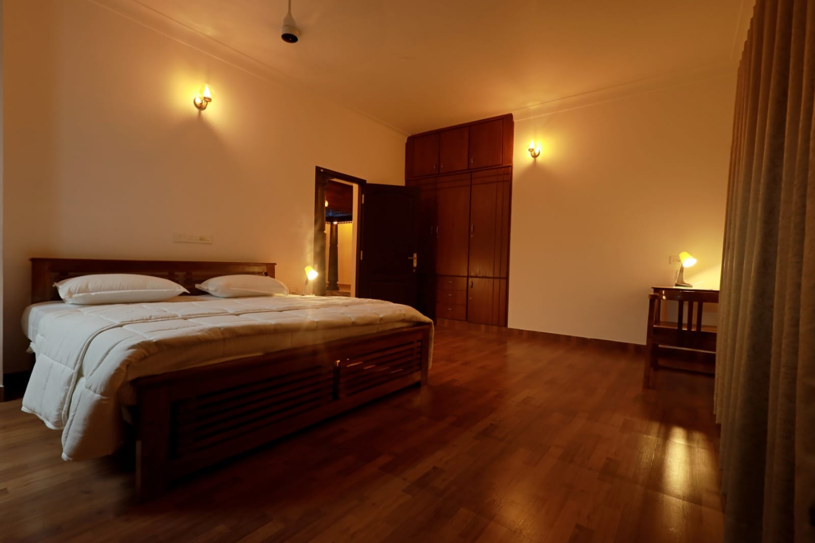 The Riverwood Room with a king bed and full-height timber wardrobe